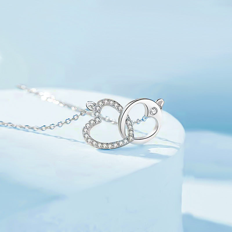 NEXEVO - สร้อยคอ Bélaire สร้อยคอเงิน ดีไซน์หัวใจและวงกลมไขว้ สไตล์มินิมอล น้ำหนักเบา ใส่ได้ทุกวัน
